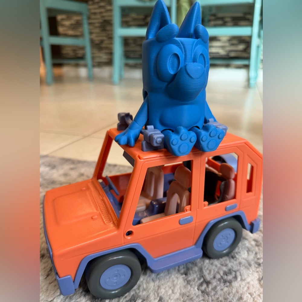 Orange and Blue Toy Car with Figure